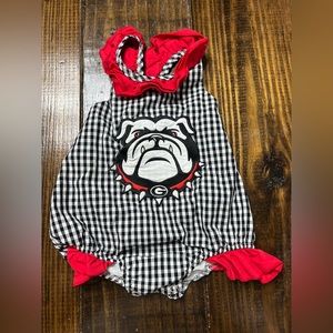 Uga Swim. Needs ironing. It was hung to dry